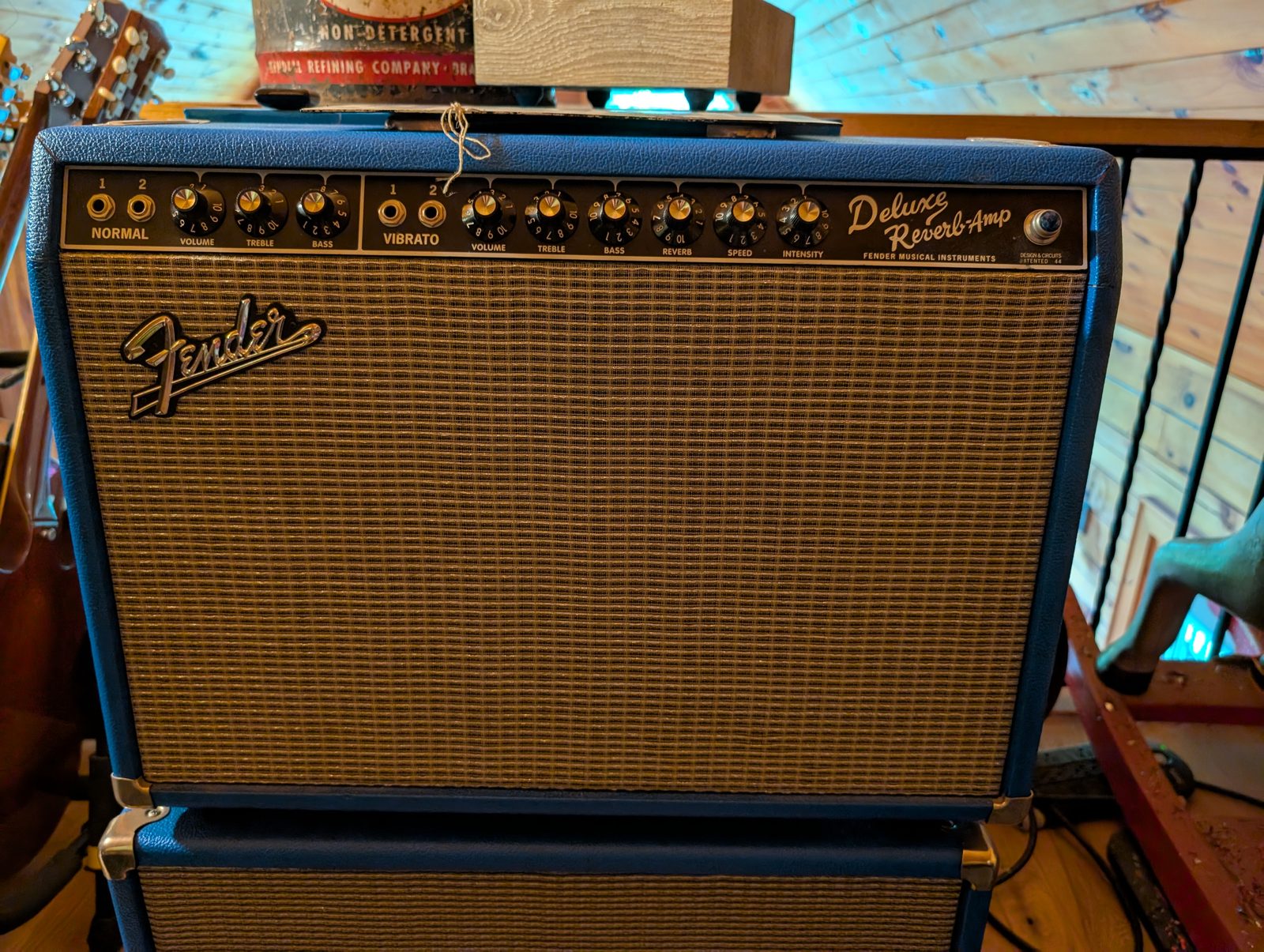 A Fender Deluxe Reverb tube amp in blue tolex
